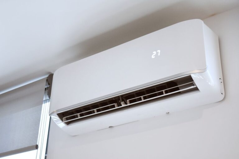Air conditioning unit on bedroom wall