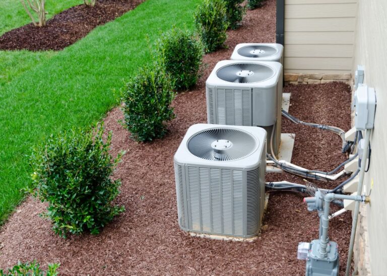 Air conditioner technician checking air conditioner operation