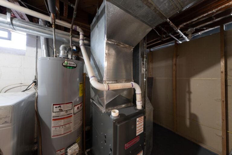home has been updated with a new furnace and hot water tank installed in the basement