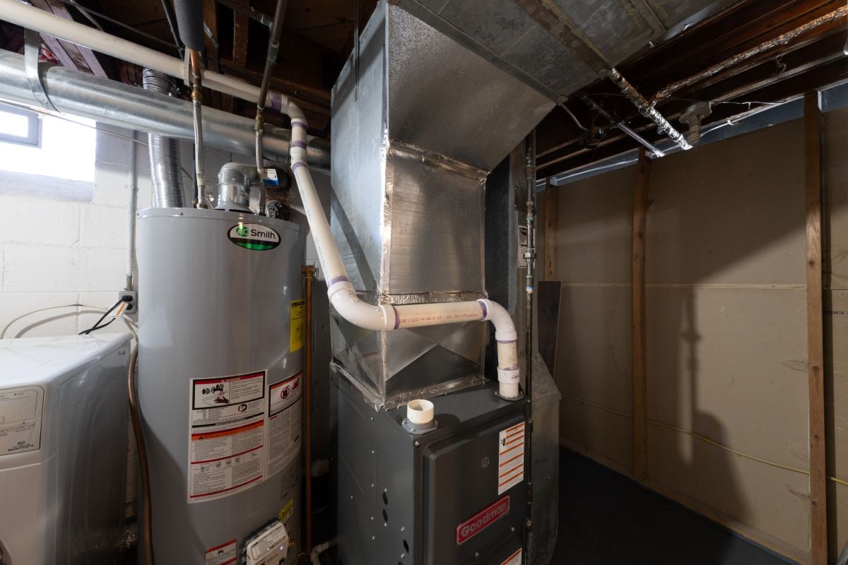 home has been updated with a new furnace and hot water tank installed in the basement