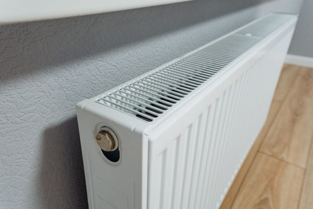 modern heating panel, contemporary wallmounted radiator with controls, minimalist wallmounted white radiator with thermostat